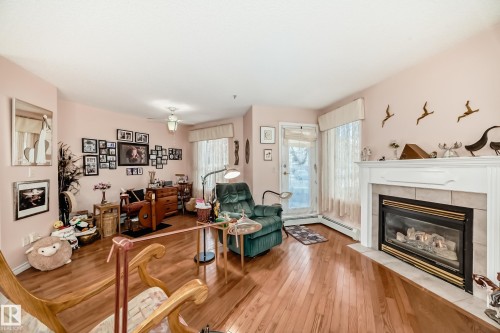 116 9730 174 Street, Edmonton, AB - Indoor Photo Showing Living Room With Fireplace