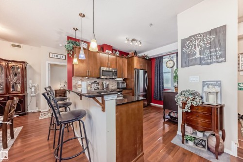 100 9940 Sherridon Drive, Fort Saskatchewan, AB - Indoor Photo Showing Kitchen