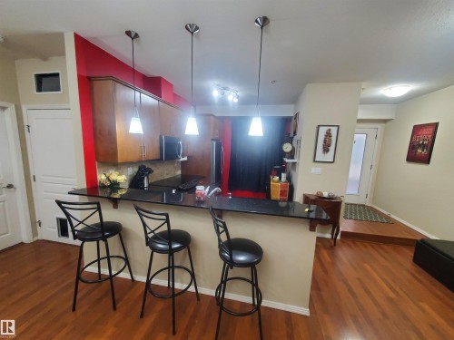 100 9940 Sherridon Drive, Fort Saskatchewan, AB - Indoor Photo Showing Kitchen