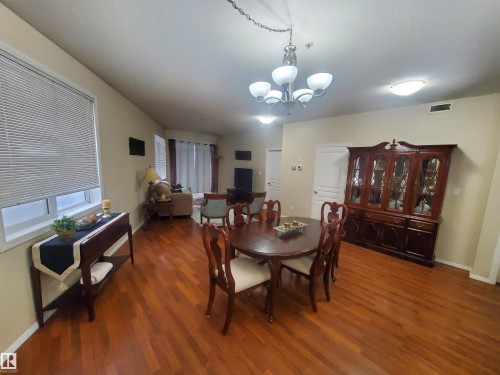 100 9940 Sherridon Drive, Fort Saskatchewan, AB - Indoor Photo Showing Dining Room