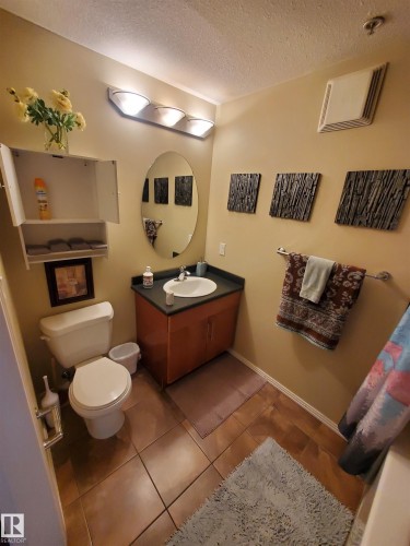 100 9940 Sherridon Drive, Fort Saskatchewan, AB - Indoor Photo Showing Bathroom