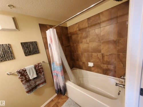 100 9940 Sherridon Drive, Fort Saskatchewan, AB - Indoor Photo Showing Bathroom