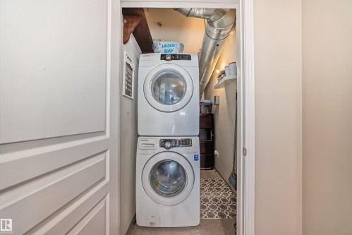 100 9940 Sherridon Drive, Fort Saskatchewan, AB - Indoor Photo Showing Laundry Room