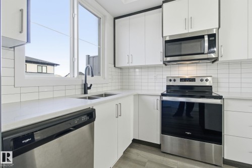 22764 97 Avenue, Edmonton, AB - Indoor Photo Showing Kitchen With Stainless Steel Kitchen With Double Sink With Upgraded Kitchen