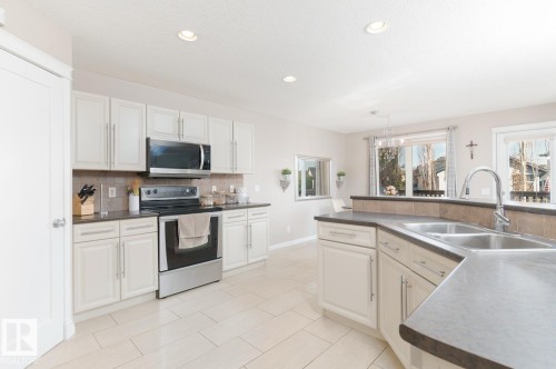 29 Haney Landing, Spruce Grove, AB - Indoor Photo Showing Kitchen With Double Sink