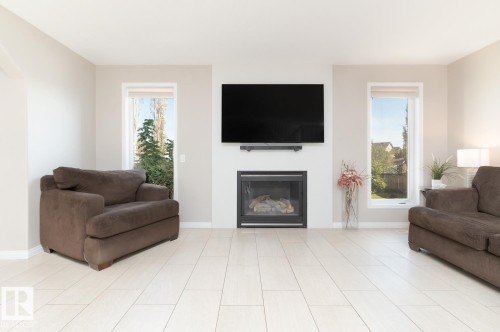 29 Haney Landing, Spruce Grove, AB - Indoor Photo Showing Living Room With Fireplace