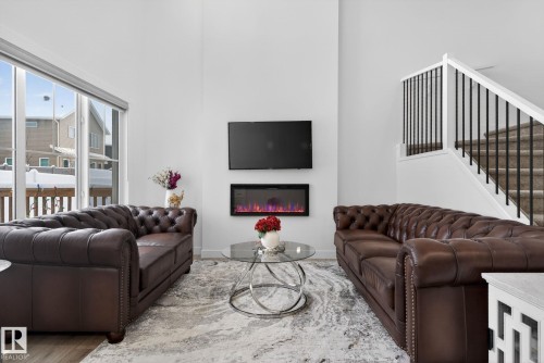 7344 177 Avenue, Edmonton, AB - Indoor Photo Showing Living Room With Fireplace