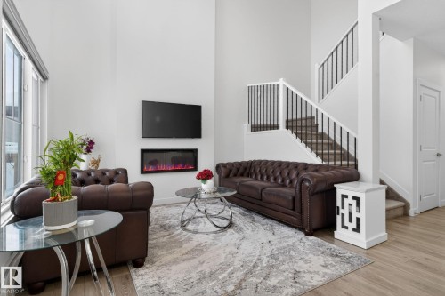 7344 177 Avenue, Edmonton, AB - Indoor Photo Showing Living Room With Fireplace