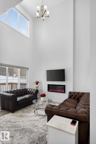 7344 177 Avenue, Edmonton, AB - Indoor Photo Showing Living Room With Fireplace