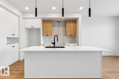 5131 69 Street, Beaumont, AB - Indoor Photo Showing Kitchen With Upgraded Kitchen