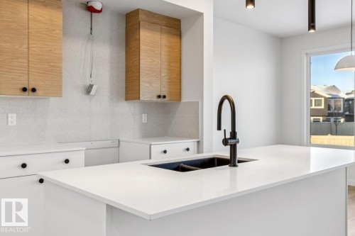 5131 69 Street, Beaumont, AB - Indoor Photo Showing Kitchen With Double Sink With Upgraded Kitchen