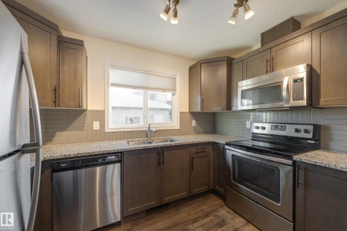 1438 Watt Drive, Edmonton, AB - Indoor Photo Showing Kitchen With Double Sink