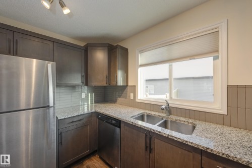 1438 Watt Drive, Edmonton, AB - Indoor Photo Showing Kitchen With Double Sink