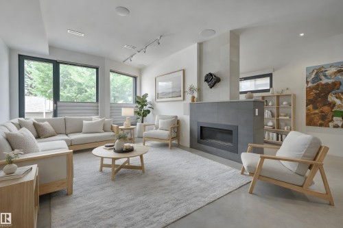 50 Sylvancroft Lane, Edmonton, AB - Indoor Photo Showing Living Room With Fireplace