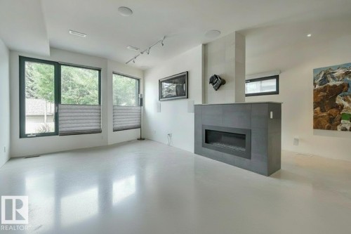 50 Sylvancroft Lane, Edmonton, AB - Indoor Photo Showing Other Room With Fireplace
