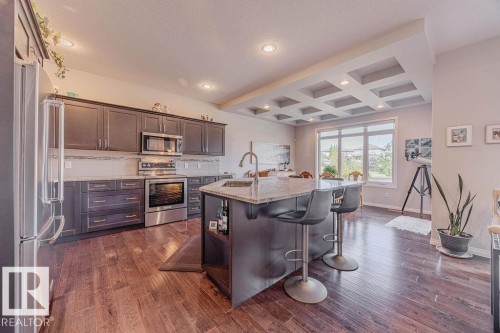 1019 Coopers Hawk Link Link, Edmonton, AB - Indoor Photo Showing Kitchen With Stainless Steel Kitchen With Upgraded Kitchen