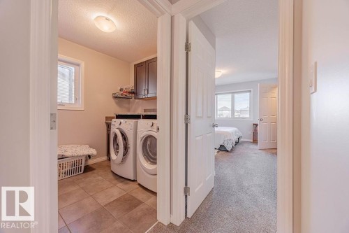 1019 Coopers Hawk Link Link, Edmonton, AB - Indoor Photo Showing Laundry Room