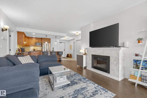 603 10142 111 Street, Edmonton, AB - Indoor Photo Showing Living Room With Fireplace