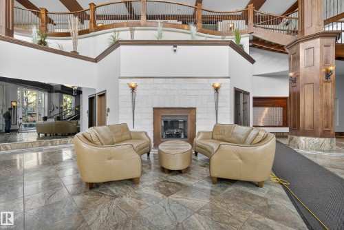603 10142 111 Street, Edmonton, AB - Indoor With Fireplace