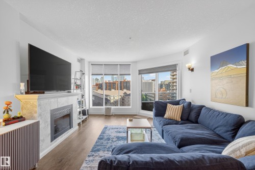 603 10142 111 Street, Edmonton, AB - Indoor Photo Showing Living Room With Fireplace
