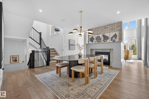 7 Jubilation Drive, St. Albert, AB - Indoor Photo Showing Dining Room With Fireplace