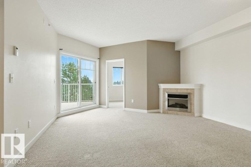 308 8931 156 Street, Edmonton, AB - Indoor With Fireplace