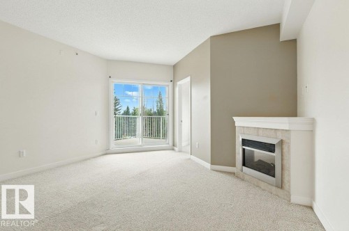 308 8931 156 Street, Edmonton, AB - Indoor With Fireplace