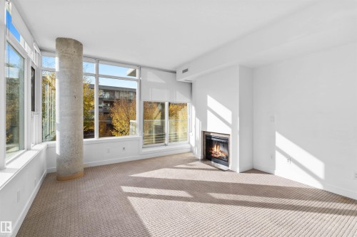 209 2606 109 Street, Edmonton, AB - Indoor With Fireplace