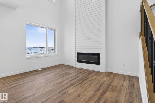 159 Pierwyck Loop, Spruce Grove, AB - Indoor Photo Showing Living Room With Fireplace