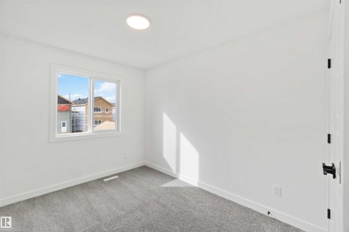 1015 Aster Boulevard, Edmonton, AB - Indoor Photo Showing Other Room