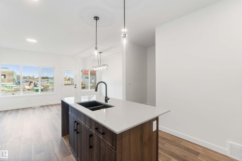 1011 Aster Boulevard, Edmonton, AB - Indoor Photo Showing Kitchen With Double Sink With Upgraded Kitchen