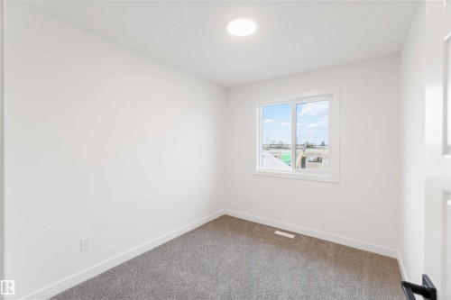 1011 Aster Boulevard, Edmonton, AB - Indoor Photo Showing Other Room