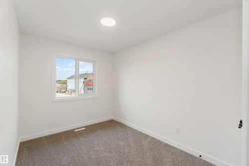 1011 Aster Boulevard, Edmonton, AB - Indoor Photo Showing Other Room