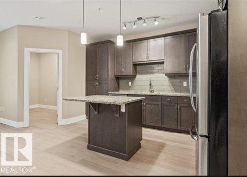 6079 Maynard Way, Edmonton, AB - Indoor Photo Showing Kitchen With Upgraded Kitchen