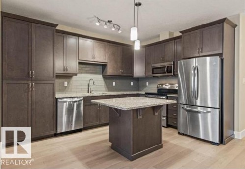 6079 Maynard Way, Edmonton, AB - Indoor Photo Showing Kitchen With Upgraded Kitchen