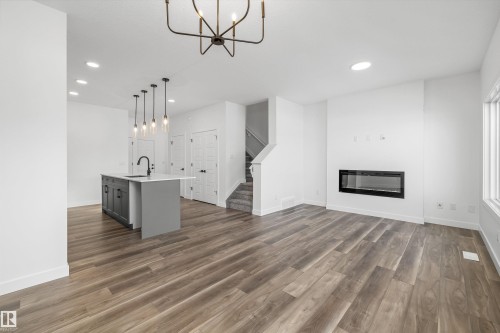4180 Kinglet Drive, Edmonton, AB - Indoor Photo Showing Living Room With Fireplace