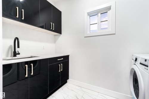 Edmonton, AB - Indoor Photo Showing Laundry Room