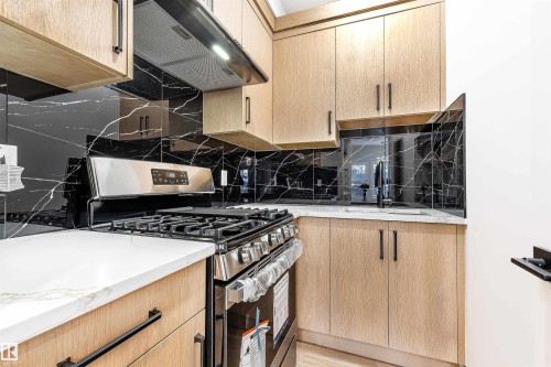 Edmonton, AB - Indoor Photo Showing Kitchen