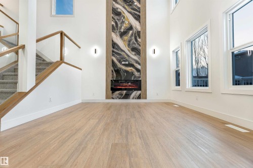 Edmonton, AB - Indoor Photo Showing Other Room With Fireplace