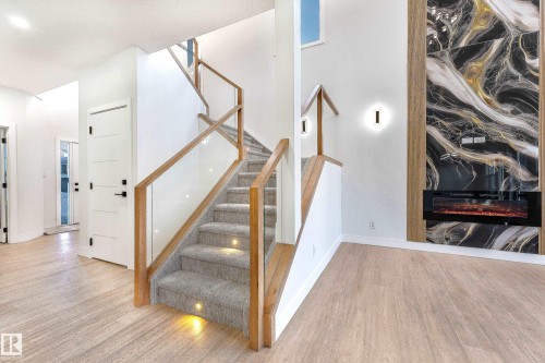 Edmonton, AB - Indoor Photo Showing Other Room With Fireplace