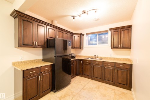 17003 71 Street, Edmonton, AB - Indoor Photo Showing Kitchen With Double Sink