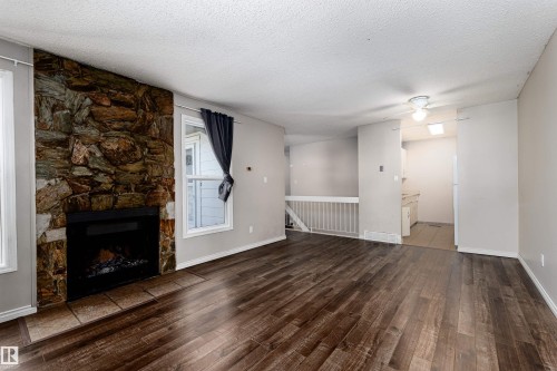 1130 Knottwood Road, Edmonton, AB - Indoor Photo Showing Other Room With Fireplace