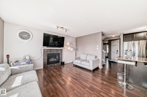 2909 18A Avenue, Edmonton, AB - Indoor Photo Showing Living Room With Fireplace