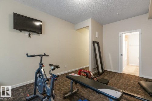 202 10524 77 Avenue, Edmonton, AB - Indoor Photo Showing Gym Room