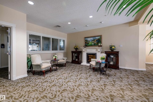 207 9820 165 Street, Edmonton, AB - Indoor With Fireplace