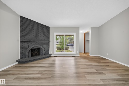 10313 150 Street, Edmonton, AB - Indoor Photo Showing Living Room With Fireplace