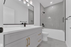Full bathroom featuring vanity, washtub / shower combination, and recessed lighting - 