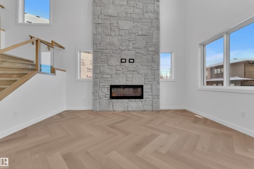 153 Graybriar Drive, Stony Plain, AB - Indoor Photo Showing Living Room With Fireplace