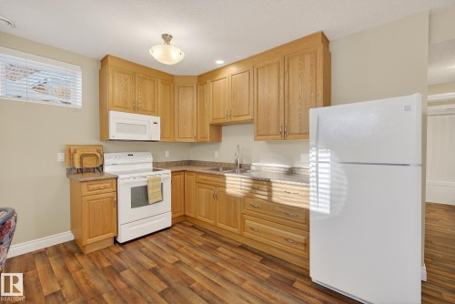 9302 93 Street, Edmonton, AB - Indoor Photo Showing Kitchen With Double Sink