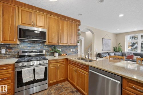 9302 93 Street, Edmonton, AB - Indoor Photo Showing Kitchen With Double Sink